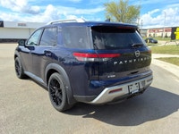 NEW TO CANADA? WE HAVE AN APPROVAL WAITING FOR YOU! The 2022 Nissan Pathfinder SL is a refined and c... (image 4)