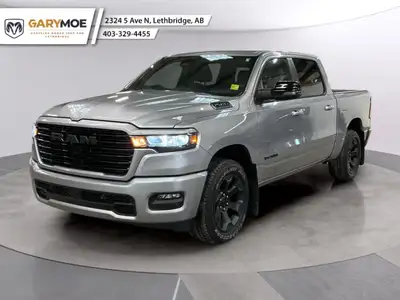 Introducing the 2025 Ram 1500 Sport 4x4 Crew Cab 57 Box, a robust truck in sleek Gray that combines...