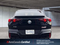 Imagine confidently commanding the streets in this black 2025 BMW X2 xDrive28i Sport Utility, a rema... (image 5)