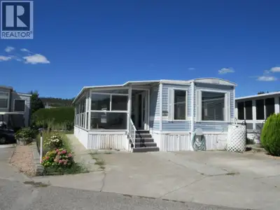 Located on a quiet cul-de-sac, this Park Model is bright and welcoming. The 10' x 30' deck is covere...