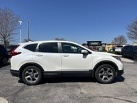 Designed for discerning drivers seeking both comfort and capability, this pristine 2017 Honda CR-V E... (image 4)