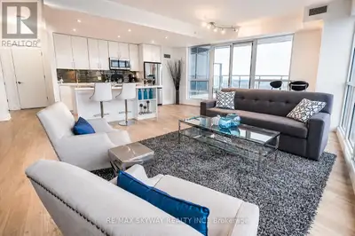 Rare lower-penthouse suite in Mimico with sweeping southwest views and a bright, open layout designe...