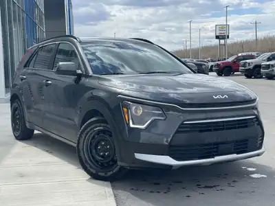 AMVIC Licensed Dealer The 2025 Kia Niro EX FWD, finished in Interstellar Grey, is a smart and effici...