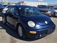 Turn heads and rediscover the joy of driving with this classic 2005 Volkswagen Beetle in a stunning... (image 8)