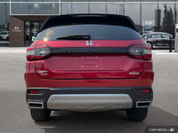 Experience the versatility and comfort of this 2023 Honda Pilot Touring SUV. Boasting a powerful eng... (image 4)