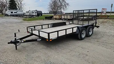 Width: 7' Length: 14' Height: 12in. Sides GVWR: 3175KG/7000LBS Axle Type: Tandem Frame: Steel Tire S...
