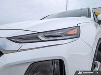 The 2020 Hyundai Santa Fe Essential 2.4L AWD in stunning white is a masterclass in all-wheel-drive p... (image 8)