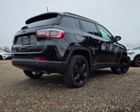 Step into the commanding presence of the 2018 Jeep Compass Altitude 4x4, cloaked in a stunning black... (image 2)