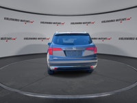 This used 2018 Honda Pilot Touring AWD is a roomy, family-ready SUV with smart features and proven V... (image 6)