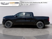 The 2026 Ram 1500 Sport is a striking truck in a bold black finish with a powerful 4x4 drivetrain, p... (image 4)