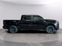 Experience the power and capability of the 2026 Ram 1500 Big Horn in a striking black finish. This 4... (image 5)