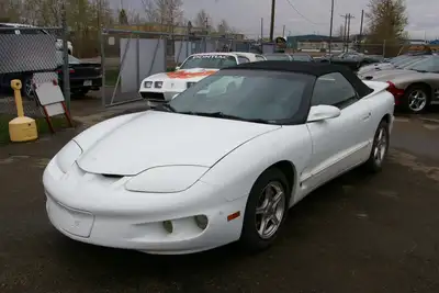 David Ts Camaro & Firebird 217,020 km's, Good condition, has a back-up camera, custom wheels, conver...