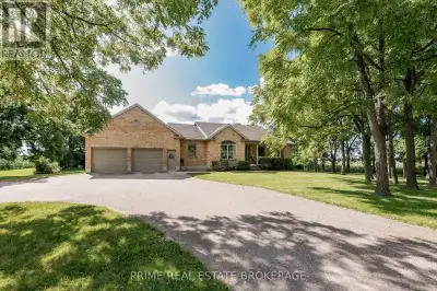 Just south of Belmont on Mapleton Line, this custom bungalow sits on just under an acre of privacy,...