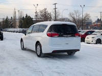 The 2026 Chrysler Grand Caravan SXT in Bright White with a Black interior offers the perfect blend o... (image 3)