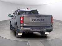 The 2025 Ram 1500 Sport 4x4 Crew Cab in an attractive gray is an impressive blend of power and luxur... (image 3)