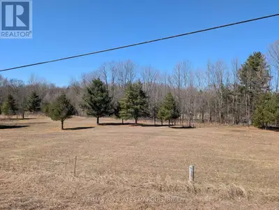 This stunning 4.15-acre lot on Sand Lake Road offers a rare opportunity to build your dream home in...