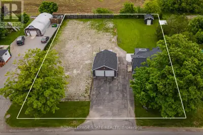 Beautiful renovated 3-bedroom home with 2 full baths situated on a half-acre (132 x 165 ft.) double-...