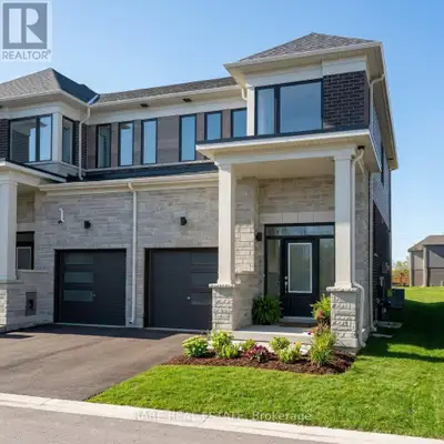 Welcome to 66 Hickey Lane, a bright 1-year-new EXECUTIVE END-UNIT townhome built by Fernbrook Homes...