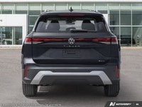 This Volkswagen Tiguan has a trusty Intercooled Turbo Regular Unleaded I-4 2.0 L/121 engine powering... (image 6)