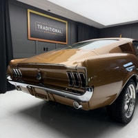 Check out this 1967 Ford Mustang Fastback. This is a gorgeous car. The gold paint is incredible and... (image 8)