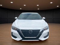 The 2023 Nissan Sentra SV CVT in pristine White is a front-wheel-drive sedan that handles beautifull... (image 2)
