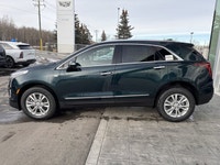 Stock #YK104298 AMVIC LICENSED DEALER The 2026 Cadillac XT5 Luxury AWD, finished in Emerald Lake Met... (image 4)