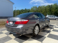 a refined midsize sedan. As an upper-tier trim, it features a leather-trimmed interior, heated front... (image 3)