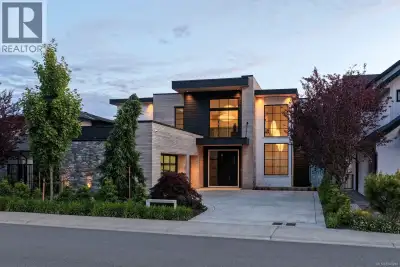 1424 Pinehurst Terrace, an exceptional custom residence where breathtaking west-facing ocean, mounta...