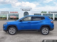 This *2025 Jeep Compass Sport* in striking *Laser Blue Pearl* delivers the perfect balance of capabi... (image 1)