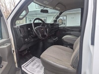 The 2020 Chevrolet Express Cargo Van 2500 Extended Wheelbase in a clean White finish, paired with re... (image 9)