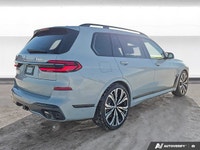 This *2023 BMW X7 M60i* is powered by a high-performance 4.4L twin-turbo V8 hybrid engine paired wit... (image 5)