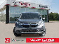 Experience the versatility and comfort of the 2018 Honda CR-V LX AWD in a sophisticated gray finish,... (image 1)