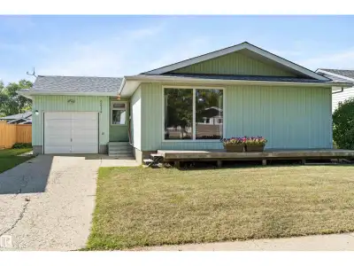 Pride of Ownership in this Lovely Family Home! This charming bungalow is set on a beautiful tree-lin...