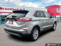 Command the road and embrace adventure in this sophisticated 2023 Ford Edge SEL, striking in Silver.... (image 5)
