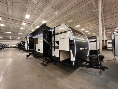 The 2026 Tracer 295DB is a spacious bunkhouse travel trailer designed for families, featuring double...
