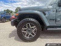 This Jeep Wrangler has a trusty Regular Unleaded V-6 3.6 L/220 engine powering this Automatic transm... (image 8)