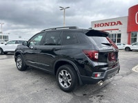 Conquer every adventure with the rugged yet refined 2023 Honda Passport TrailSport, a vehicle engine... (image 6)