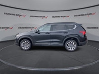 This Hyundai Santa Fe has a dependable Turbo Gas 4cyl 2.5 L engine powering this Automatic transmiss... (image 4)