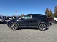 Navigate city streets and conquer daily commutes with ease in the 2020 Kia Sportage EX. This sporty... (image 3)