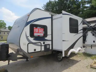 with slide; power awning; power jack; air conditioning; furnace; hot water tank; large dual fridge a...