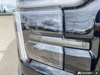 Introducing the stunning 2026 Ford F-150 Lariat LARIAT 4WD SuperCrew 5.5' Box in a sleek black finis... (image 8)