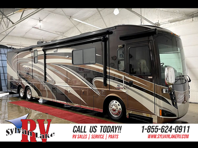 The 2011 Winnebago Tour 42QD delivers a luxury RV experience that feels more like a high-end condo o...