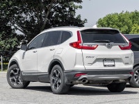 Discover refined comfort and confident capability with the 2017 Honda CR-V Touring AWD. Finished in... (image 4)