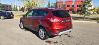 Our 2015 Ford Escape Titanium in Sunset Orange is in stock and ready for your driveway! Call to book... (image 2)