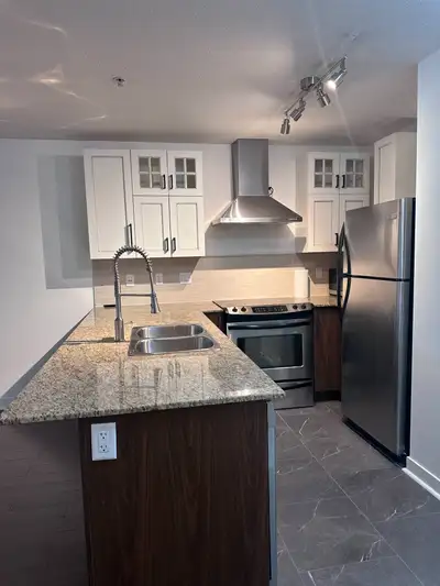Spacious 1 Bed + Den at The Grove | 2 Parking Stalls + Locker | Walnut Grove Welcome to The Grove, a...