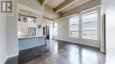 This stunning 2-bedroom, 2-bathroom hard loft at the iconic Merchandise Building offers 1,000 sq. ft...