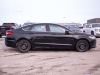 This 2017 Ford Fusion SE is powered by a reliable 2.5L four-cylinder engine paired with a smooth aut... (image 8)