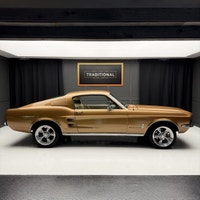 Check out this 1967 Ford Mustang Fastback. This is a gorgeous car. The gold paint is incredible and... (image 4)