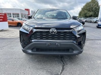 Command the road in this sleek 2023 Toyota RAV4 LE, boasting a Midnight Black Metallic exterior that... (image 1)