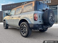 Embrace the spirit of adventure with the 2022 Ford Bronco. This stunning Shadow Black convertible is... (image 3)
